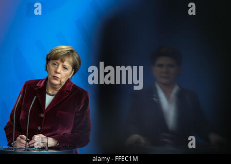 Berlin, Germany. 12th Feb, 2016. German Chancellor Angela Merkel (L) and visiting Polish Prime Minister Beata Szydlo attend a press conference at the Chancellery in Berlin, Germany, on Feb. 12, 2016. © Zhang Fan/Xinhua/Alamy Live News Stock Photo