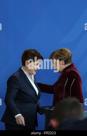 Berlin, Germany. 12th Feb, 2016. German Chancellor Angela Merkel (R) and visiting Polish Prime Minister Beata Szydlo attend a press conference at the Chancellery in Berlin, Germany, on Feb. 12, 2016. © Zhang Fan/Xinhua/Alamy Live News Stock Photo