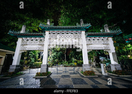Entrance arch to the Chinese Garden at Rizal Park at night, in Ermita, Manila, The Philippines. Stock Photo