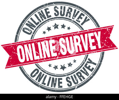 online survey red round grunge vintage ribbon stamp Stock Photo