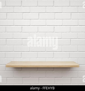 Empty wooden shelf on white brick wall Stock Photo