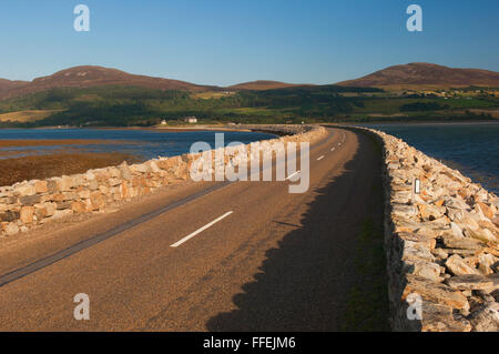 The North Coast 500 Route as it follows the causeway across the Kyle of Tongue - Sutherland, Scotland. Stock Photo