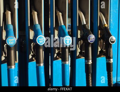Petrol nozzles are bseen at an Aral gaz station in Berlin, pictured on December, 30, 2015. Photo: Wolfram Steinberg/dpa Stock Photo