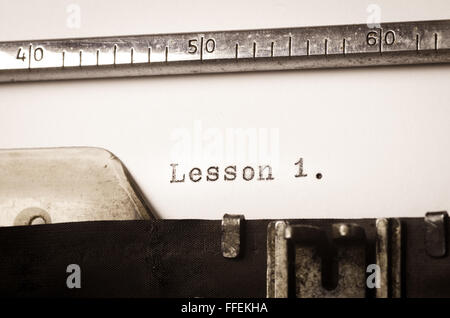 word lesson 1 written on old typewriter Stock Photo