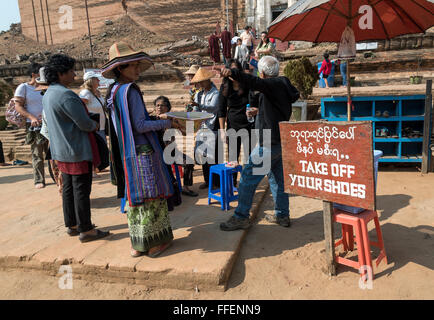 Take off your shoes sign at the entrance to Mingun Pagoda, Burma (Myanmar) Stock Photo