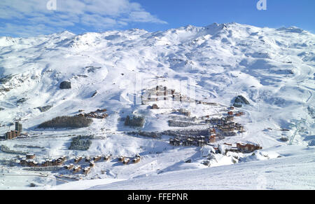 Aerial view of an alpine village, ski resort of Les Menuires, in 3 Valleys French Alps, with snowy slopes in high mountains Stock Photo