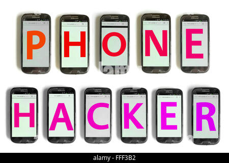 Phone Hacker written on the screen of smartphones photographed against a white background. Stock Photo