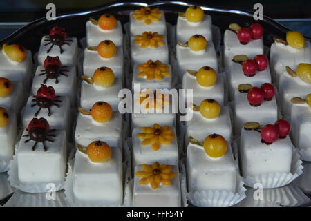 French 'Petit Four' cakes on a plate Stock Photo
