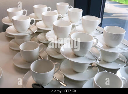 Coffee cups lined up in cafeteria or coffee house Stock Photo