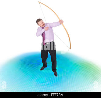 Businessman practicing archery on techno digital background Stock Photo