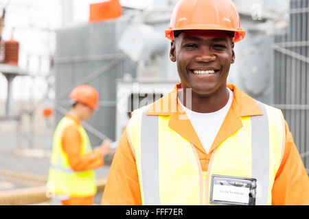 close up portrait of senior African American technician in substation Stock Photo