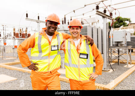 handsome electrical engineers standing in power plant Stock Photo