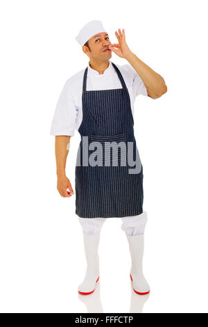 middle aged chef making delicious hand sign Stock Photo