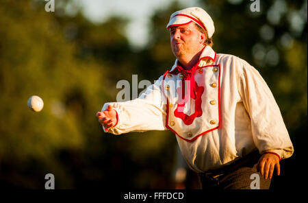 Baseball reenactors recreate an old fashioned, turn of the 20th century baseball game at Fort Vancouver, Washington Stock Photo