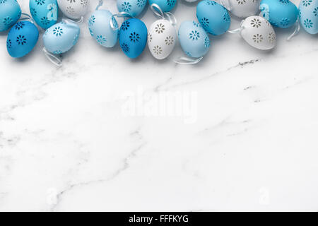 Easter eggs on white marble stone Stock Photo