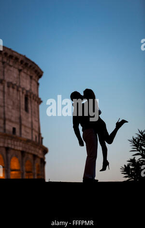 Couple at colosseum. Rome. Italy Stock Photo