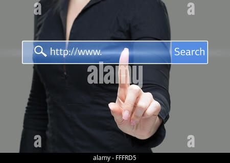 Young woman touching web browser address bar with www sign Stock Photo