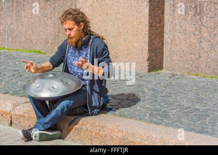 Street musician playing on hang, Saint Petersburg, Russia Stock Photo