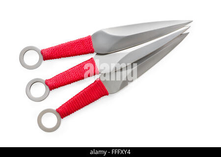 Three throwing knives with red handles isolated on white Stock Photo