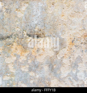 The aged sand stone wall texture background Stock Photo