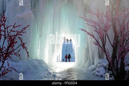 Shijiazhuang, China's Hebei Province. 13th Feb, 2016. People visit the frozen waterfall at the Blood Fairy Spring of Shijiazhuang, capital of north China's Hebei Province, Feb. 13, 2016. Credit:  Wang Xiao/Xinhua/Alamy Live News Stock Photo