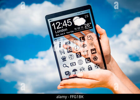 Tablet with a transparent display in human hands. Concept actual future innovative ideas and best technologies humanity. Stock Photo