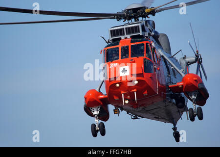 Royal Navy Search & Rescue Sea King Helicopter over Southport. Stock Photo