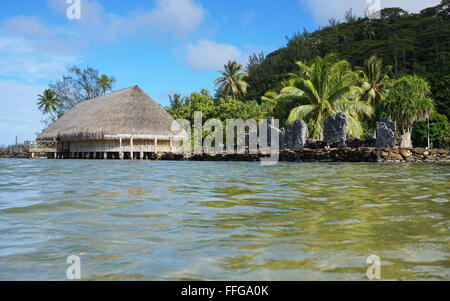 Marae and Fare Potee on the shore of the lake Fauna Nui, Maeva, Huahine island, French Polynesia Stock Photo