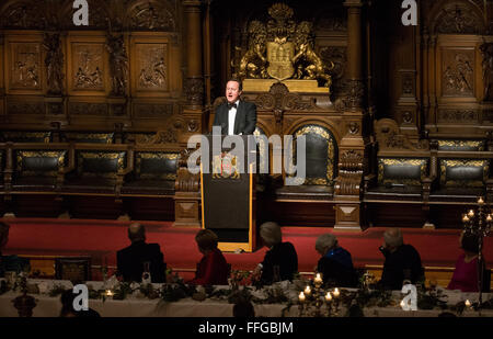 Hamburg, Germany. 12th Feb, 2016. Britain's Prime Minister David Cameron delivers a speech at the Matthiae dinner at the city hall of Hamburg, Germany, 12 February 2016. Britain's Prime Minister David Cameron and German Chancellor Angela Merkel are guests of honour at the oldest feast in the world. Since 1356, the leaders of the Hansa city invite distinguished guests to the Matthiae dinner. Photo: CHRISTIAN CHARISIUS/dpa/Alamy Live News Stock Photo