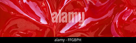 Panorama - abstract pattern of a red plastic surface in close-up Stock Photo