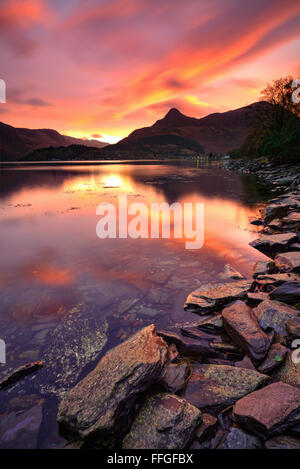 The Pap of Glencoe in the Scottish Highlands, reflected in Loch Leven at sunrise in early November. Stock Photo