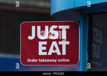 Just Eat takeaway fast food sign logo Stock Photo - Alamy