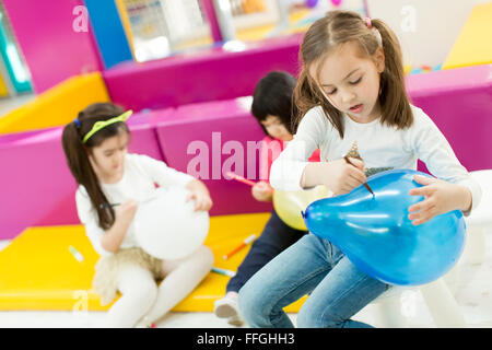 Multiracial liitle girls at playroom Stock Photo