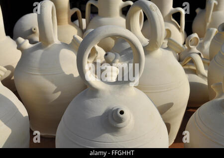 Traditional pottery for sale on a market stall, Spain. Stock Photo