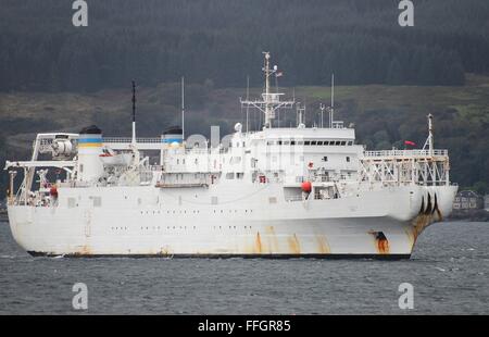 USNS Zeus (T-ARC-7), a cable-laying vessel of the US Navy, is seen approaching Cloch Point in Gourock. Stock Photo