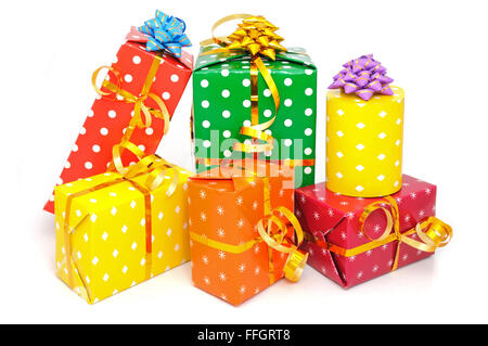 Multi-coloured boxes with gifts isolated on white backgrouhd Stock Photo