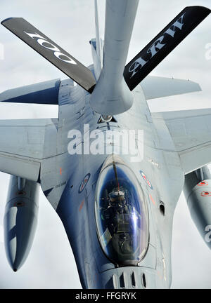 A Royal Norwegian Air Force F-16 Fighting Falcon prepares for a refuel from a KC-135 Stratotanker assigned to Royal Air Force Station Mildenhall, England, during a training sortie Sept. 5, 2014, over Norway. The KC-135 was part of a four-ship which enables tankers to provide concentrated aerial refueling support for large forces during major operations.