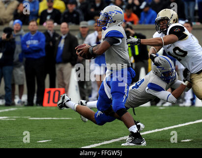 An Air Force Falcons football player is tackled during the Army-Air Force  football game at the United States Military Academy at West Point, New York  Nov. 5, 2016. The Falcons defeated the