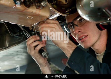 U.S. Air Force Airman 1st Class Justin Hildreth, 28th Aircraft Maintenance Squadron aerospace propulsion journeyman, provides pre-flight maintenance for a B-1B Lancer during Red Flag 12-2 at Nellis Air Force Base, Nev. Red Flag is a combat training exercise involving the air forces of the United States and its allies. Stock Photo