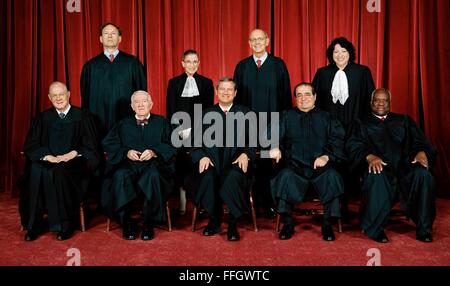 U.S. Supreme Court justices official portrait for the 2009 Roberts court.  Antonin Scalia official portrait. Top row (left to right): Associate Justice Samuel A. Alito, Associate Justice Ruth Bader Ginsburg, Associate Justice Stephen G. Breyer, and Associate Justice Sonia Sotomayor. Bottom row (left to right): Associate Justice Anthony M. Kennedy, Associate Justice John Paul Stevens, Chief Justice John G. Roberts, Associate Justice Antonin G. Scalia, and Associate Justice Clarence Thomas. Stock Photo