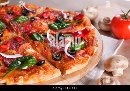 Pizza Slice lift Stock Photo
