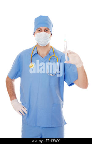 Full isolated studio picture from a young male doctor with syringe in his hand. Stock Photo