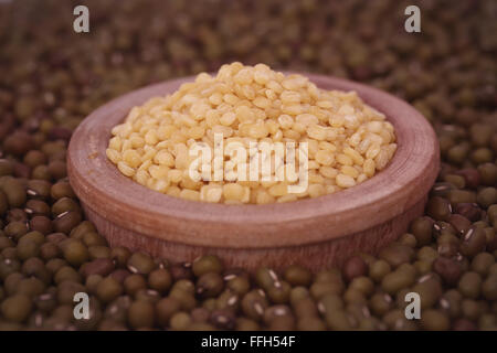 Dry mung bean in wooden bowl