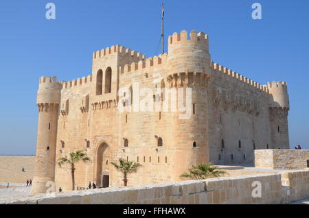 The Citadel of Qaitbay is a 15th-century defensive fortress located on the Mediterranean sea coast, in Alexandria Stock Photo