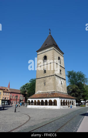 KOSICE, SLOVAKIA - AUGUST 03, 2013: Monument and old tower on the central square in Kosice, Slovakia. Stock Photo
