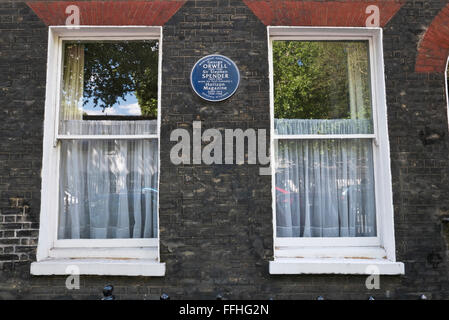 A commemorative blue plaque for George Orwell (25 June 1903 – 21 January 1950)  on display on a wall in London, United Kingdom. Stock Photo