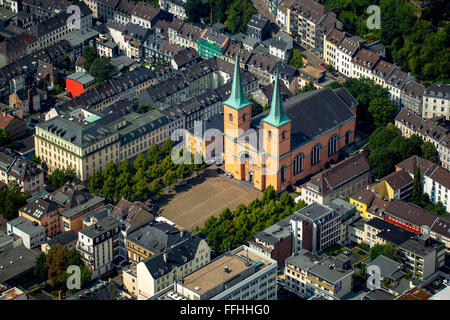 Aerial view, Basilica of St. Lawrence in Elberfeld is the main Catholic church Wuppertal built in neoclassical style in pink Stock Photo