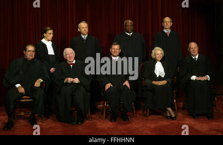 Feb. 14, 2016 - Washington, District of Columbia, United States of America - Washington, DC - October 31, 2005 -- The Supreme Court justices pose for their official photograph at the United States Supreme Court in Washington, DC on October 31, 2005. Left to right bottom row: Associate Justices Antonin Scalia, John Paul Stevens, Chief Justice John G. Roberts, Jr., Associate Justices Sandra Day O'Connor and Anthony M. Kennedy. Top Row: Associate Justices Ruth Bader Ginsburg, David H. Souter, Clarence Thomas, and Stephen G. Breyer. Credit: Dennis Brack - Pool via CNP (Credit Image: © Denn Stock Photo