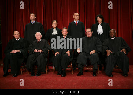 Sept. 29, 2009 - Washington, District of Columbia, United States of America - Washington, DC - September 29, 2009 -- The Justices of the United States Supreme Court posed for their official ''family '' group photo and then allowed members of the media to take photos afterwards at the U.S. Supreme Court in Washington, DC on Tuesday, September 29, 2009. Front row, left to right: Associate Justice Anthony M. Kennedy; Associate Justice John Paul Stevens; Chief Justice of the United States John G. Roberts, Jr.; Associate Justice Antonin Scalia; and Associate Justice Clarence Thomas. Back row, le Stock Photo