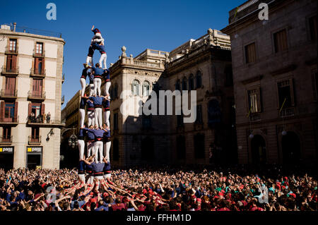 Human towers (castell in catalan) are built in Barcelona for the Santa Eulalia winter Festival. Stock Photo